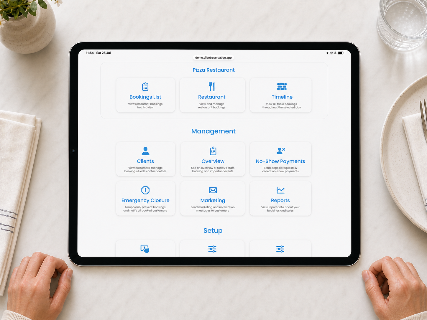 Client Reservation Admin Home Screen displayed on a landscape iPad on a restaurant table
